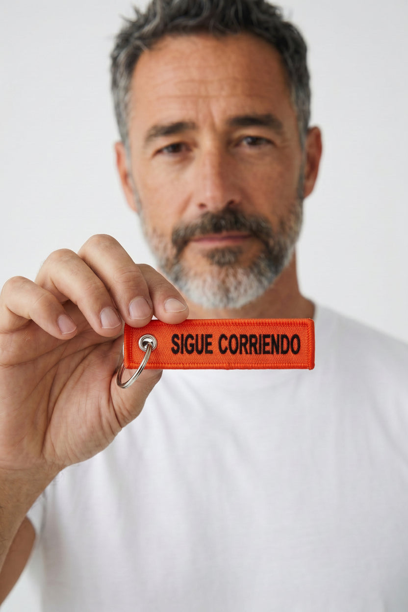 Llavero "Sigue Corriendo"